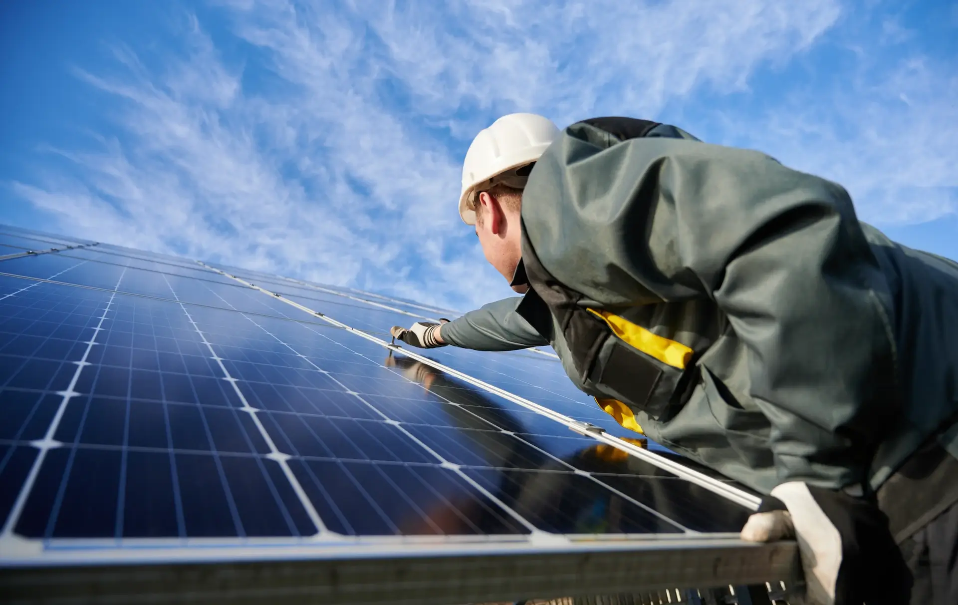 A man working and providing a solar panel installation
